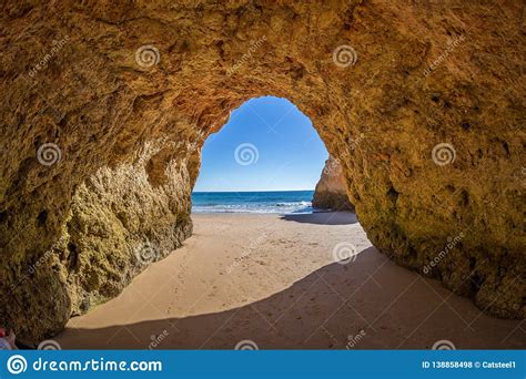 Famous Caves In A Beach Rock Formation In The Algarve Portugal Stock