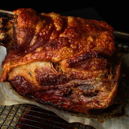 The skin crisps to crunchy cracklings, and the meat melts with juicy tenderness. Ultra-Crispy Slow-Roasted Pork Shoulder Recipe - (4.6/5)