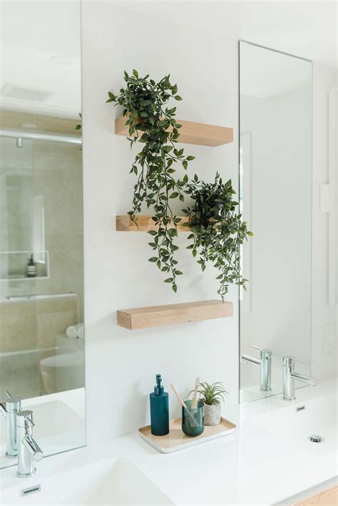 Cascading Plants Staggered On Floating Shelves Create A Calming Effect