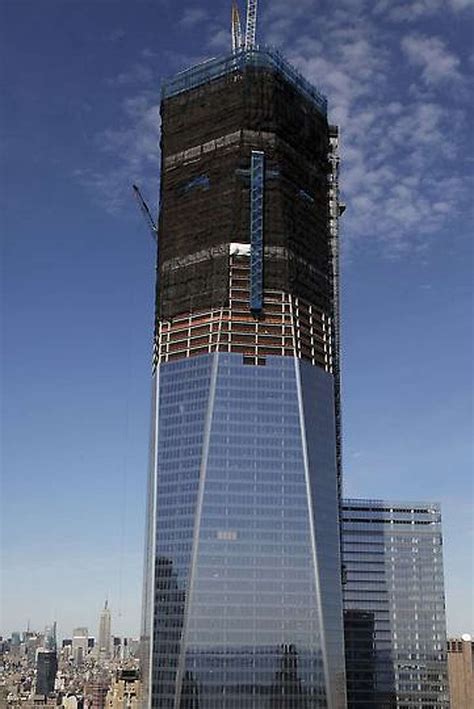 Photos One World Trade Center Set To Pass Empire State Building As New