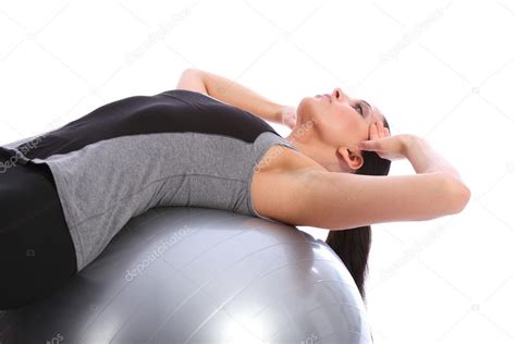 Abdominal Crunches By Fit Woman On Exercise Ball Stock Photo