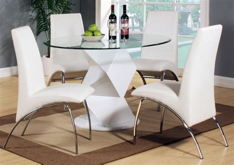 The lutina round dining table is a perfectly proportioned round table supported by industrial style metal legs that protrude at an angle. Modern round white high gloss clear glass dining table & 4 ...
