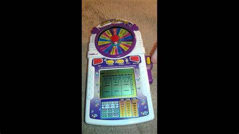 Rare 1998 Tiger Electronics Wheel Of Fortune Slots Lcd Game Youtube