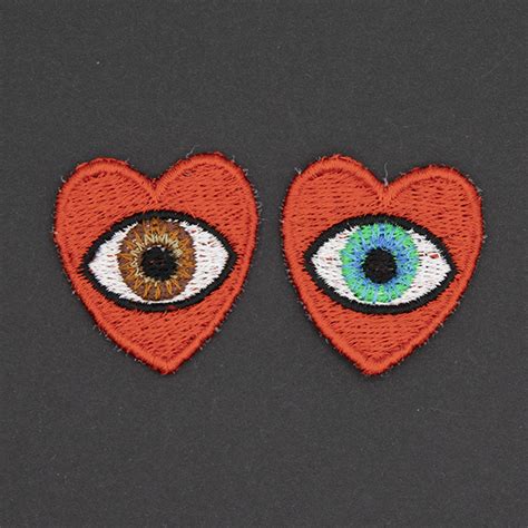 small heart and eye embroidered patch the unruly stitch