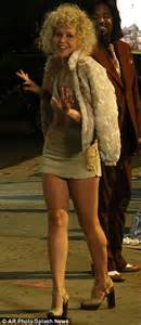 Maggie Gyllenhaal In A Curly Blonde Wig And Tiny Bra As She Films The