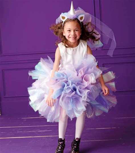 Look at this curly rainbow dream of a tail! DIY Unicorn Costume - Kids Halloween Costumes | JOANN