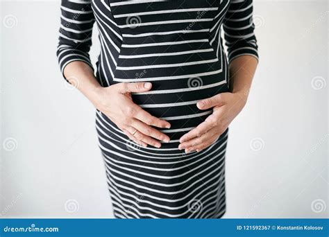Pregnant Woman In Striped Dress Stock Image Image Of Happy Tummy 121592367