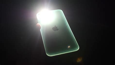 Tap the flashlight icon to turn your flashlight on or off. How to Turn on your iPhone Flashlight By Tapping its Back ...