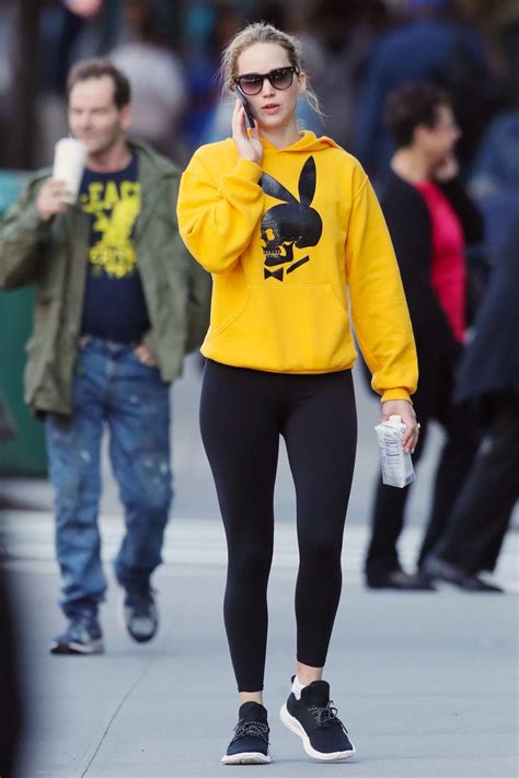 Jennifer Lawrence Rocks A Bright Yellow Hoodie And Black Leggings While