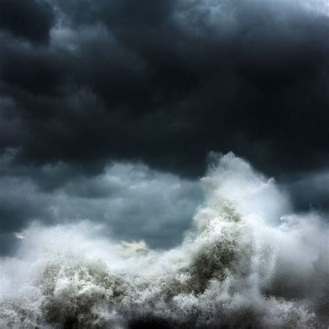 Powerful Photos Of Crashing Waves Set Against A Dark Sky Nature