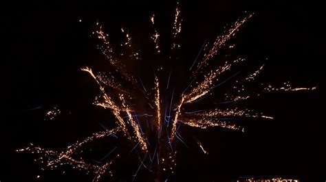 Download Wallpaper 1366x768 Salute Fireworks Holiday Sparks Black