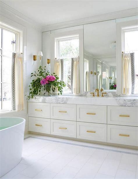 Deck mounted installation holes : white and gold glam bathroom | Modern master bathroom ...
