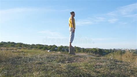 Young Sporty Man Standing At Yoga Pose Outdoor Caucasian Guy