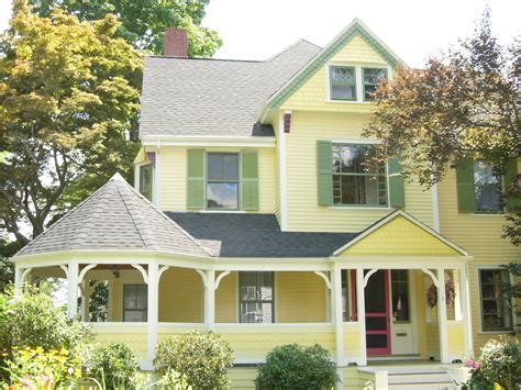 Using Yellow Paint Colors Exterior For A Bright And Cheerful Home