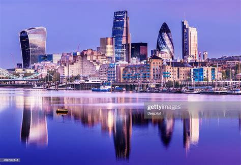 Downtown London City Skyline Reflection In River Thames At