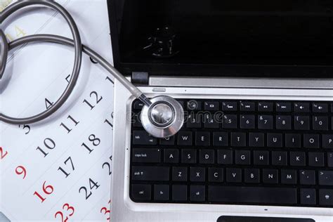 Laptop Computer Stethoscope And Calendar Stock Image Image Of