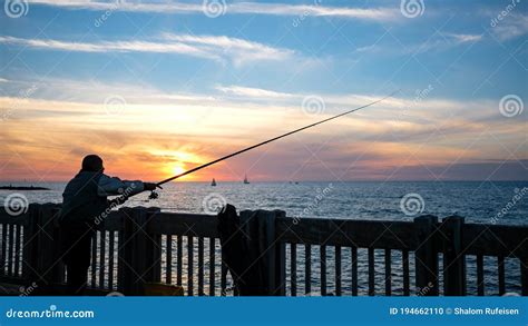 Sunset Fisherman Fishing Stock Photo Image Of Evening 194662110