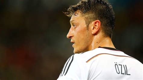 His passing is out of this world. Mesut Oezil of Germany looks on | Germany soccer team, Fifa world cup, World cup