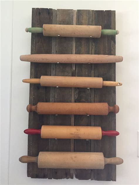 Rolling Pin Display Made With Old Floor Boards And Horseshoe Nails