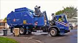Photos of Garbage Trucks On Route In Action