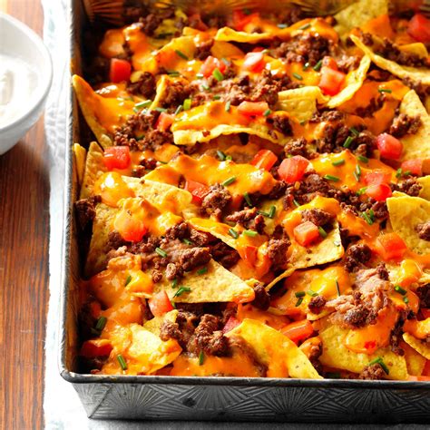 Preheat oven to 350 degrees f. Queso Baked Nachos Recipe | Taste of Home