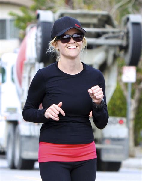 reese witherspoon showing off her ass in tights while after jogging in