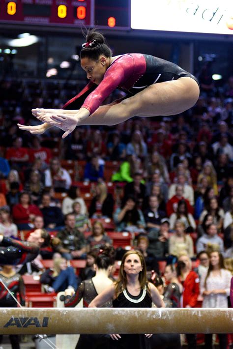 University Of Denver Gymnast Nina Mcgee Competes A Pike Jump On Beam