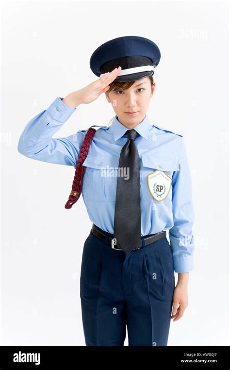 A Female Security Guard Saluting Stock Photo Alamy