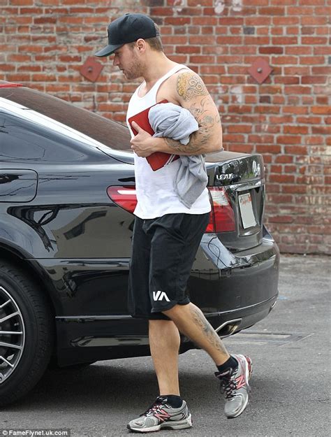 Ryan Phillippe Shows Off His Buff Biceps And Tattoos As He Heads To