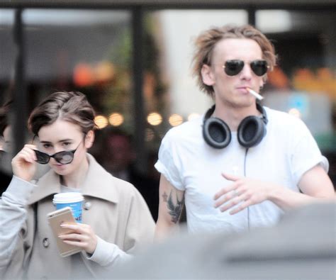 LILY COLLINS And Jamie Campbell Bower Out And About In London 06 25