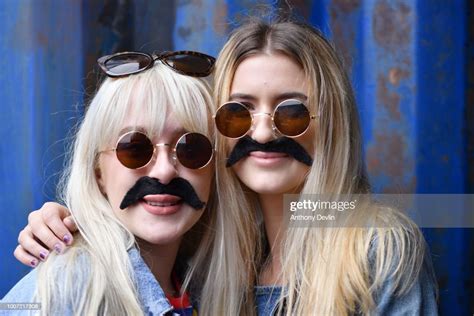 Amy Donnelly And Mackenzie Greene Pose For A Portrait As Beatles Fans