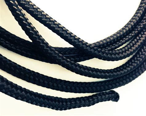 The classic, all purpose, 1/8 camp cord with a million or so uses. Swindon Watersports Nylon Braided cord rope twine paracord in BLACK - sold in 5m Lengths 1.3mm ...