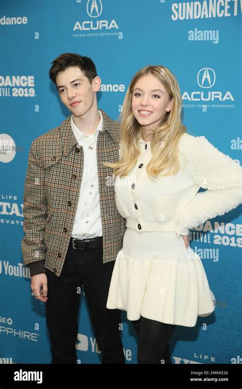 Actor Griffin Gluck Left And Sydney Sweeney Pose At The Premiere Of