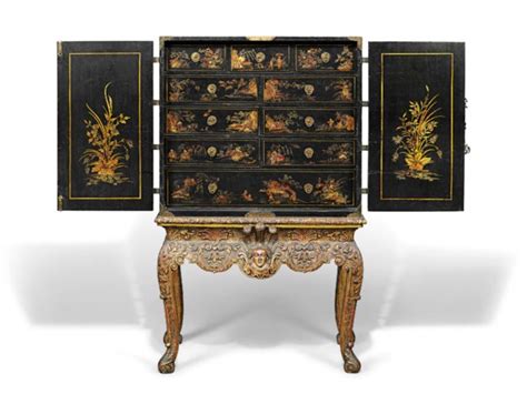 A Brass Mounted Black Gilt And Polychrome Japanned Cabinet On Stand