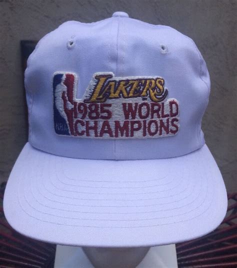 If browsing through the site as. Los Angeles Lakers 1985 Championship Snap Back Hat Cap NBA ...