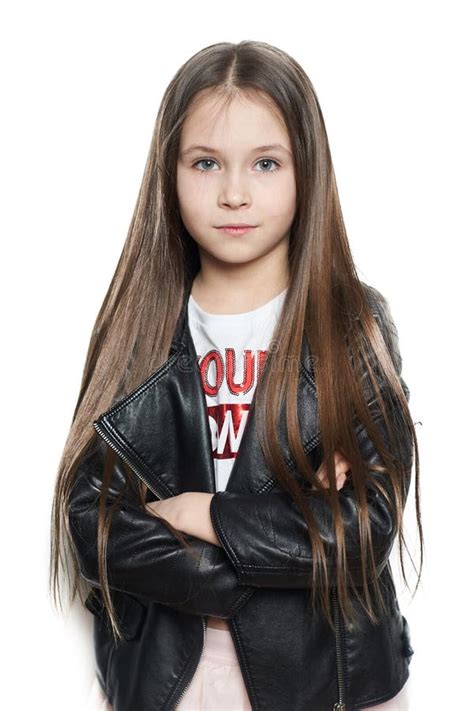 Beautiful Girl Of European Appearance With Long Hair On A White Background For Advertising