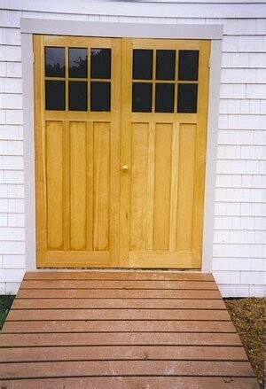 Classic wooden doors with transoms. Garden Shed Doors