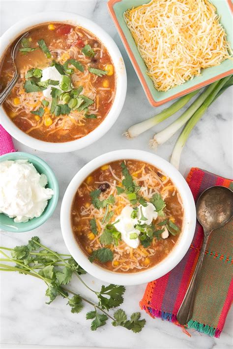 I used parboiled rice and canned mexican flare diced tomatoes. Slow Cooker Mexican Chicken and Rice Soup | Boulder Locavore