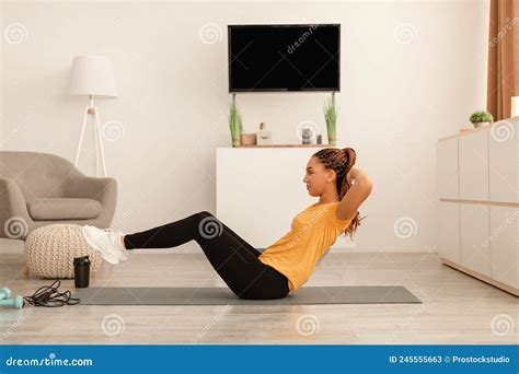 Fit Black Lady Exercising Doing Abs Crunches Flexing Abdomen Indoors