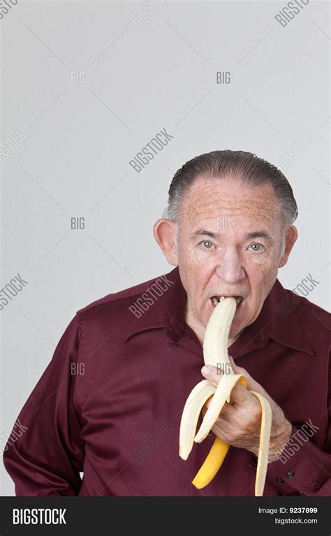 Man Eating Banana Image Photo Free Trial Bigstock
