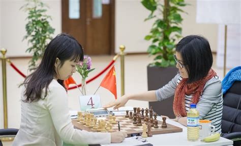 fide women s grand prix in sharjah r8 ju wenjun and hou yifan draw remain in lead chessdom