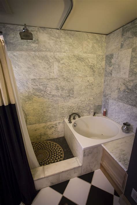 You can even have a japanese soaking tub in a more classic, traditional bathroom. Japanese soaking tub, Vermont marble shower | Tub shower ...