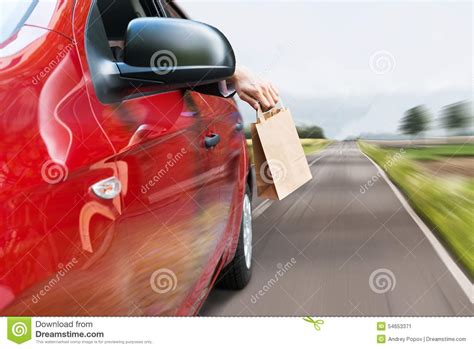 Person Throwing Trash Out Of Car Window Stock Image Image Of Hand