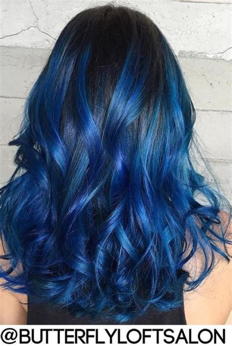 Probably brown hair and blue eyes or brown hair and brown eyes. Gimme the Blues: Bold Blue Highlight Hairstyles
