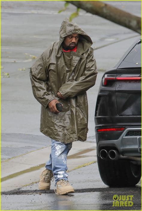 Kanye West Braves Rainy Weather While Arriving At His Office Photo