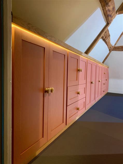 Clothes Cupboards In The Eaves Of A Converted Barn Eaves Storage Loft