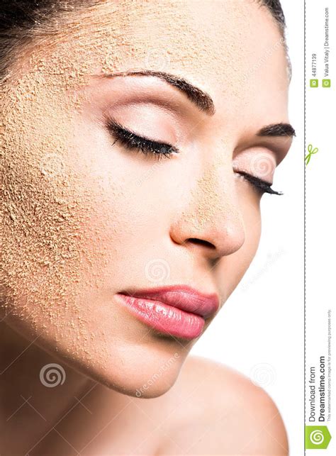 Face Of A Woman With Cosmetic Powder On Skin Stock Image