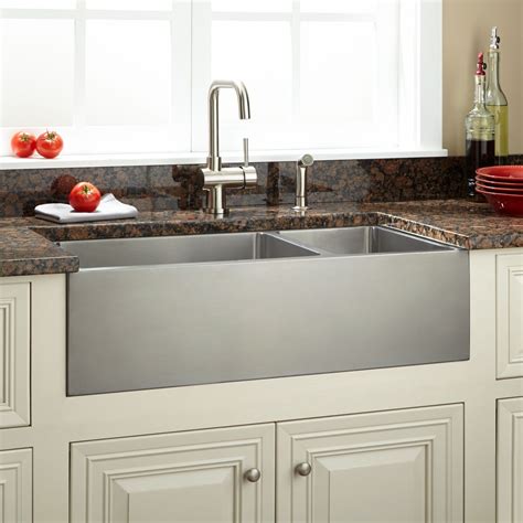 Available in a lovely white color, this product brightens your space and complements existing decor. 33" Optimum 70/30 Offset Double-Bowl Stainless Steel Farmhouse Sink - Beveled Apron | Stainless ...