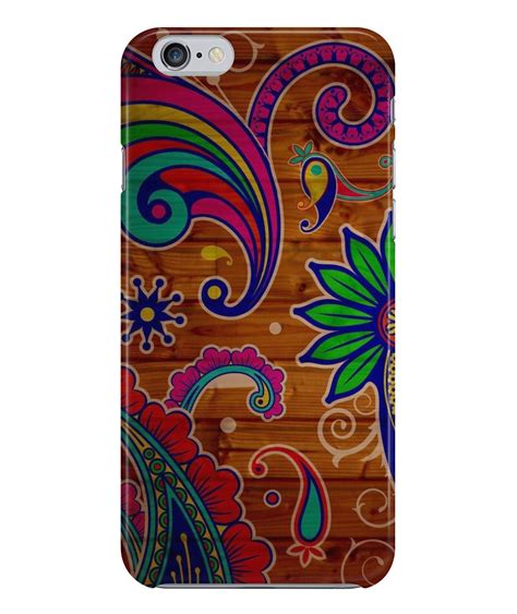 An Iphone Case With Colorful Flowers And Paisley Designs On The Wooden