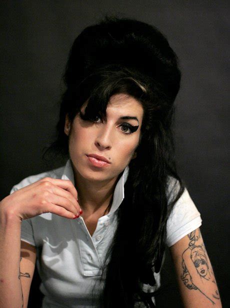 Amy jade winehouse was born on september 14, 1983, in the suburb of southgate in london, england. Amy Winehouse in the UK - Amy Winehouse: Her Life in ...